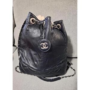 Chanel Classic Black Leather Bucket Bag with Red Interior